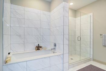 Separate showers with rainfall showerheads*